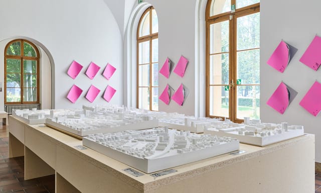 Minimalist ZAZ Bellerive function room with architectural models for corporate showcases or networking.