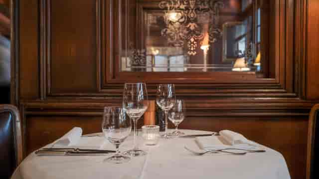 Upscale Hotel Kindli restaurant set for executive dinner and networking events.