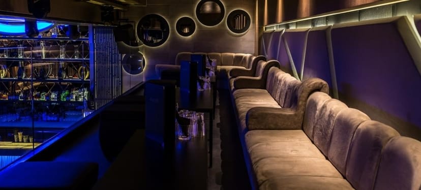 VIP lounge with sleek seating for professional networking and exclusive corporate events.