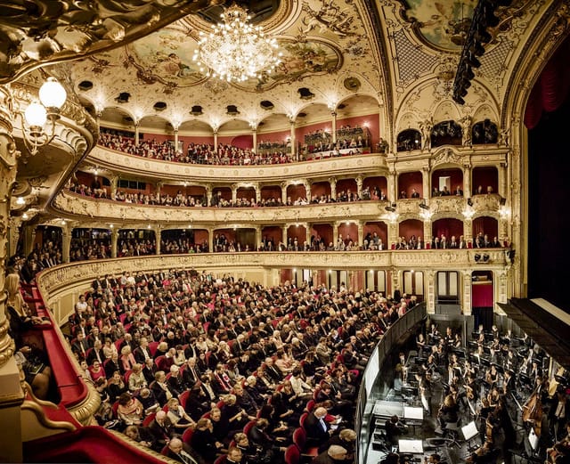 Opernhaus Zürich main stage with historic tiered seating for keynote events and performances.