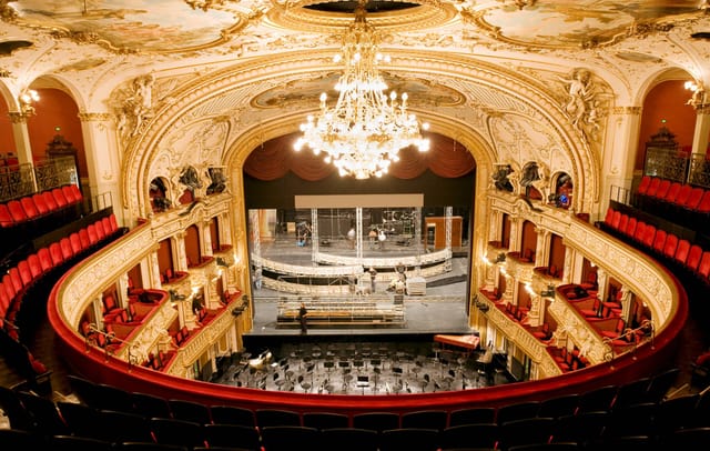 Opernhaus Zürich plenary venue with tiered seating for corporate events and conferences.