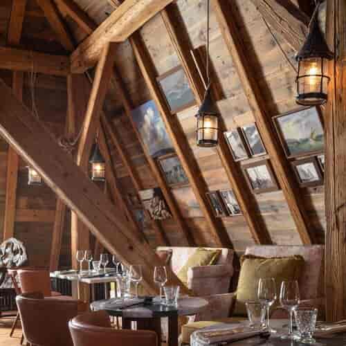 Rustic La Muña restaurant interior for intimate VIP dinners and corporate events.