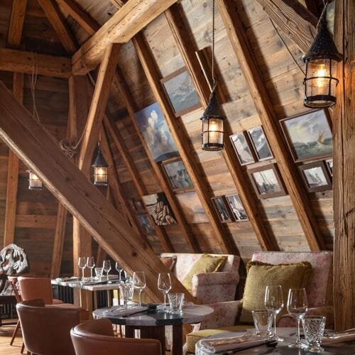 Rustic La Muña restaurant interior for intimate VIP dinners and corporate events.
