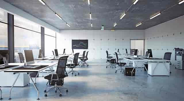 Modern open-plan workspace with fixed desks for corporate meetings and professional coworking.