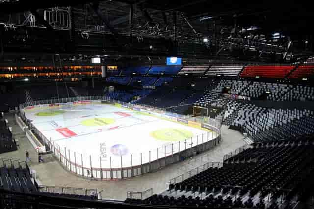 Hallenstadion arena with ice floor for gala events and experiential venue staging.