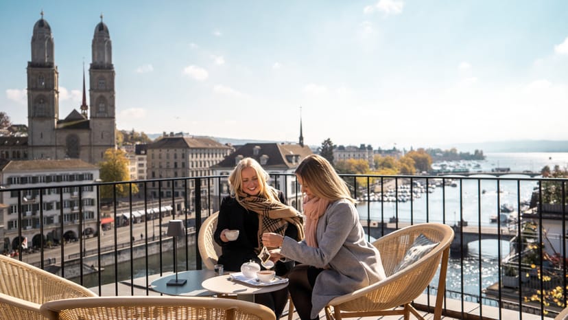 Rooftop terrace bar in Zurich with panoramic city views, perfect for VIP networking and events.