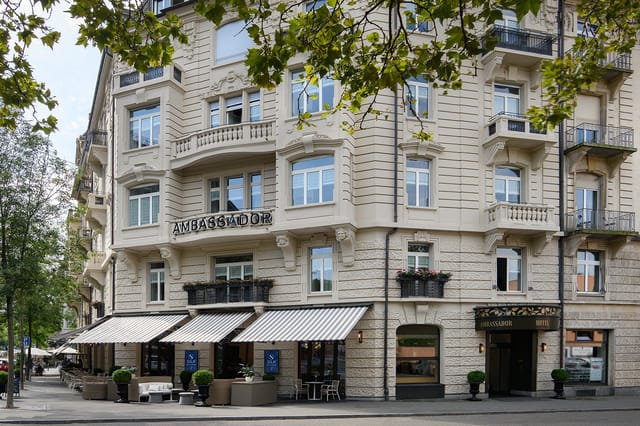 Upscale rooftop terrace at boutique hotel for executive breakouts and networking events.