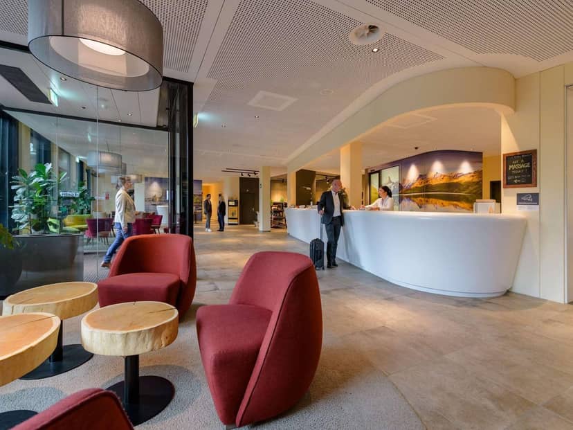 Modern meeting room at Mercure Zurich City for professional business conferences and seminars.