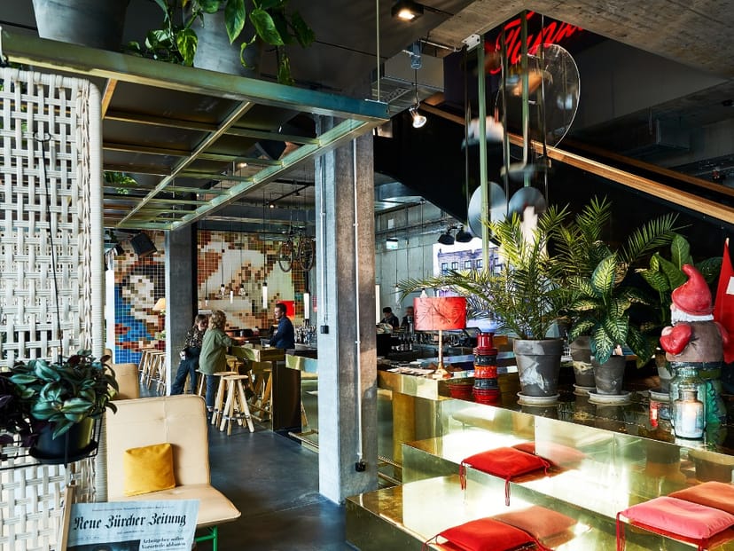Industrial-chic 25hours Hotel Zurich restaurant for networking mixers and creative brand events.