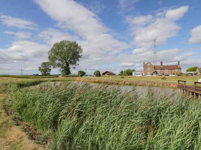 Barn conversion venue in Far Coley Farm for corporate retreats and team-building workshops.