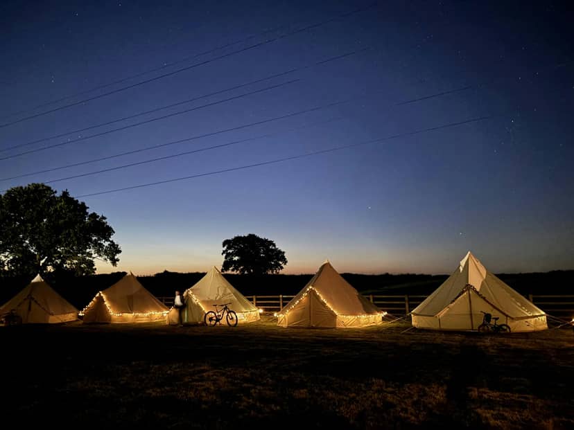 Luxury barn conversion glamping village for experiential corporate retreats and boutique off-sites.