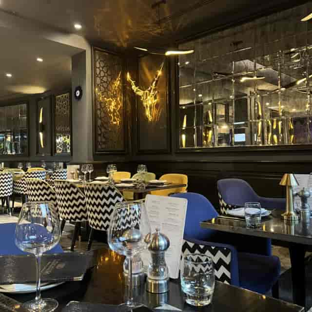 Boutique veranda at Lokkum Bar & Grill with bold upholstery, ideal for VIP dinners and events.