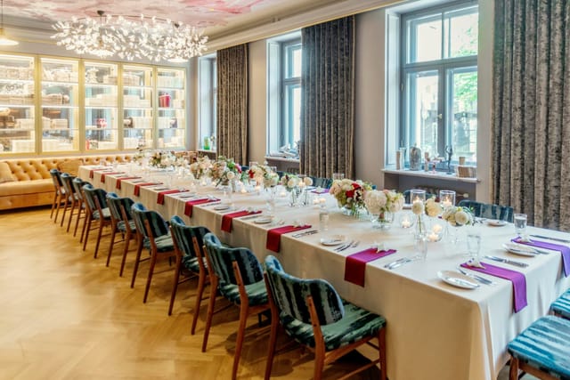 Upscale private dining boardroom setup at Grand Poet Hotel, elegant event venue.