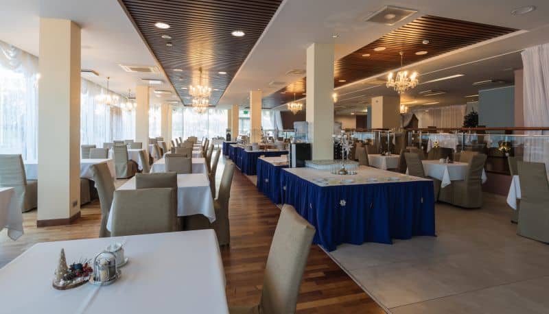 Banquet hall at Riga Islande Hotel with buffet stations for corporate events and conferences.