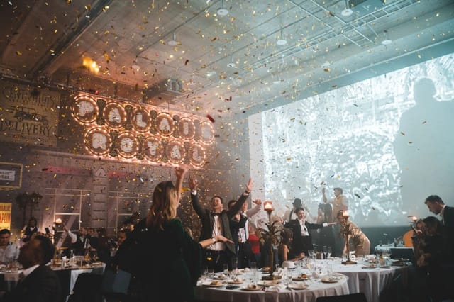 Gala finale at SAM hall, FANTADROMS: confetti drop, theatrical lighting, corporate event, awards.