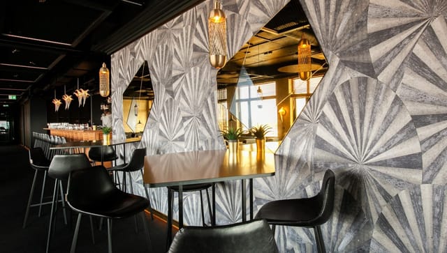Art Deco cocktail bar in MINOX, ideal for upscale networking events and corporate receptions.