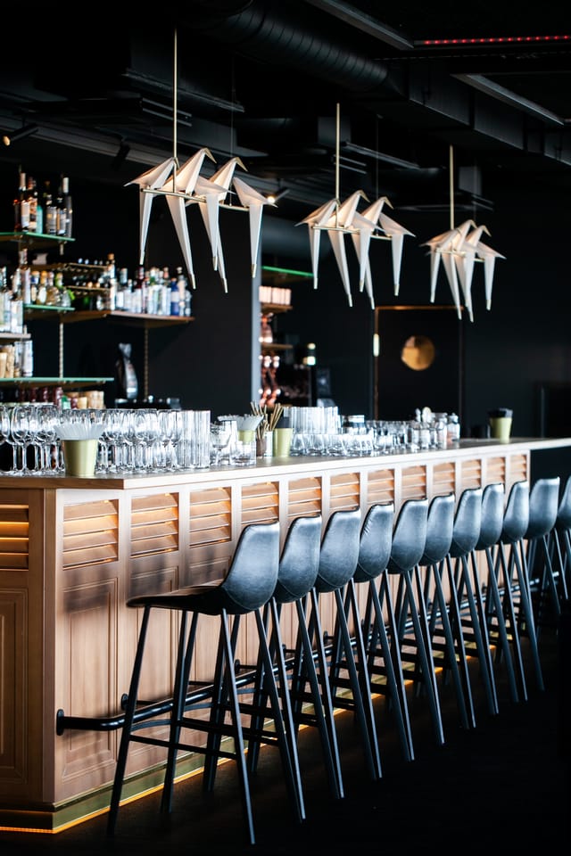 Modern MINOX cocktail bar setup for corporate networking and upscale event receptions.