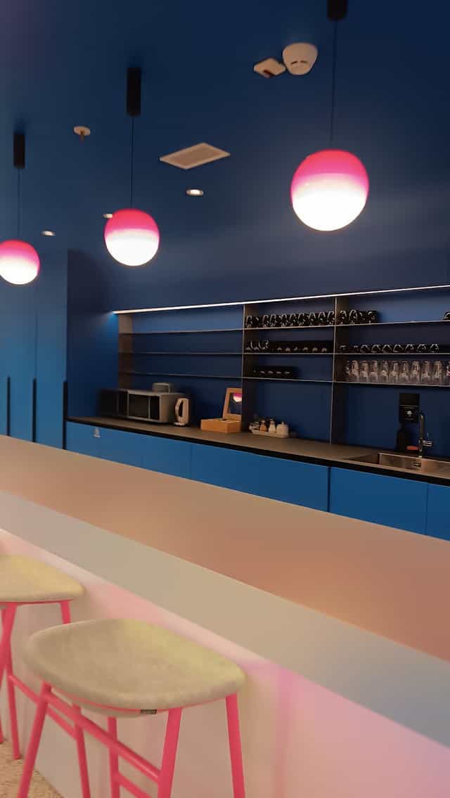 Modern meeting room refreshment station with integrated sink for business events and coffee breaks.