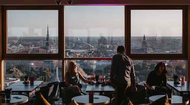 Outdoor bar in Riga with panoramic skyline views, ideal for executive networking and cocktails.