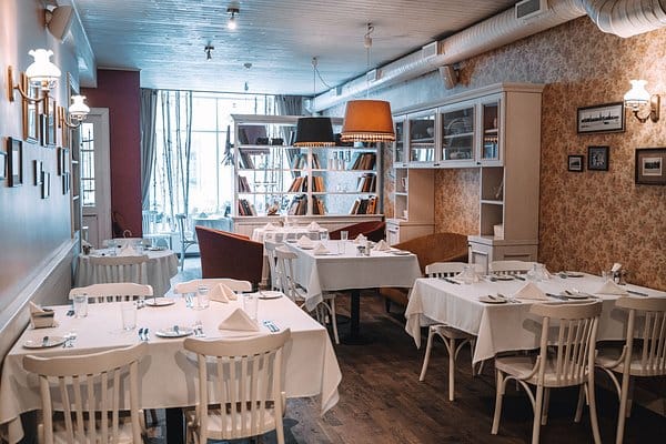 Cozy restaurant dining room in Riga, perfect for boutique business lunch or intimate event venue.