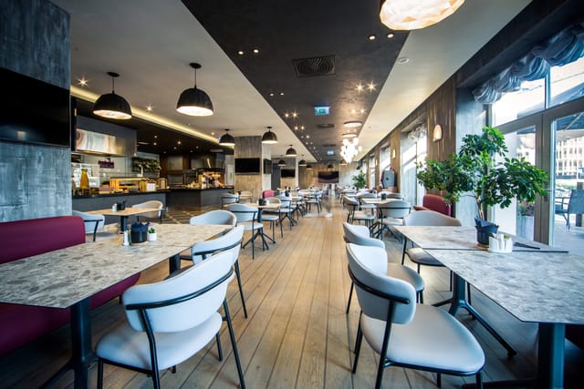 Modern Mercure Hotel Riga Centre restaurant for corporate networking and team lunches.