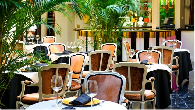 Grand Palace Hotel dining room with cabaret seating for corporate luncheons and VIP events.