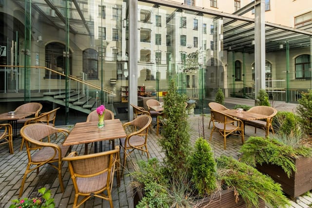 Modern conference room courtyard for corporate events and networking receptions.