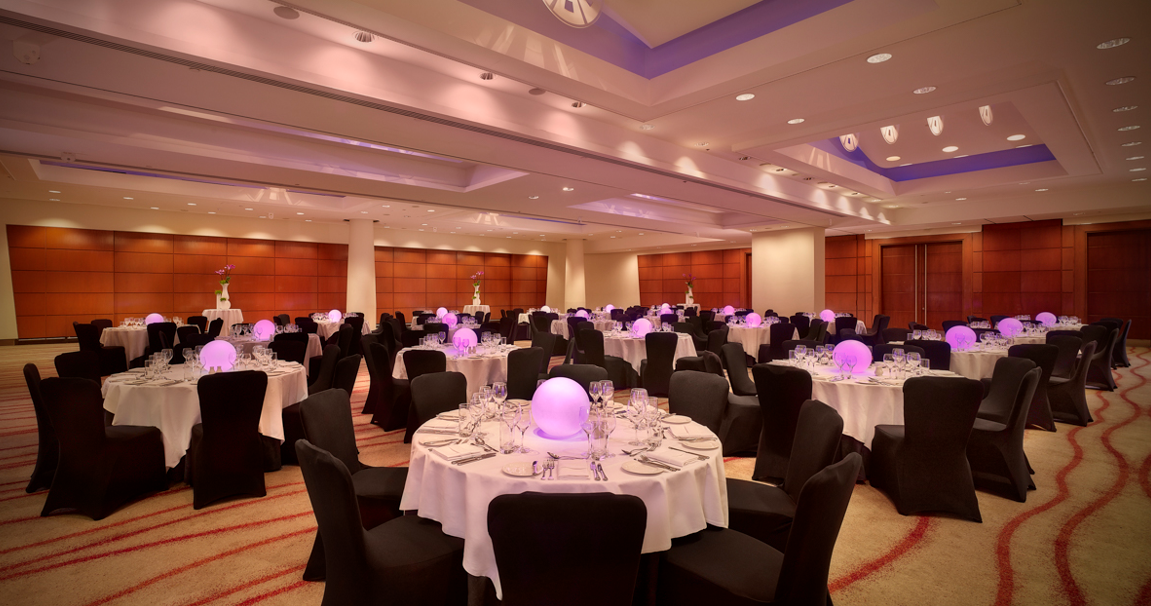 Victoria Suite at Park Plaza Victoria London, elegant dinner setup for corporate events. - Banner