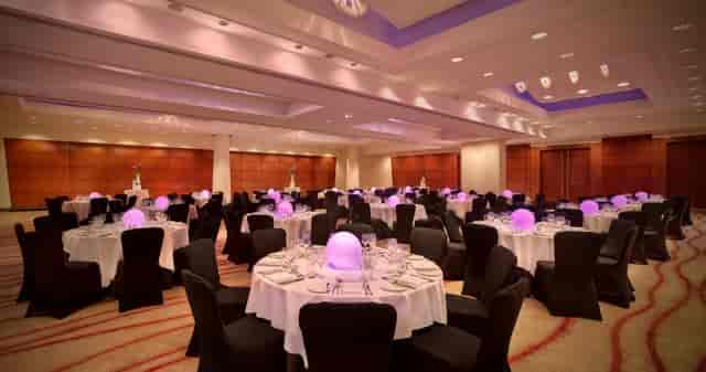 Victoria Suite at Park Plaza Victoria London, elegant dinner setup for corporate events.