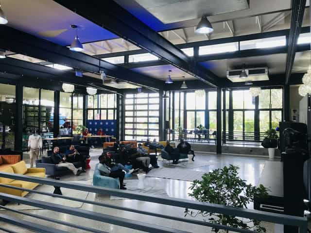 Industrial-chic Bistro venue with lounge seating, ideal for corporate workshops and networking.