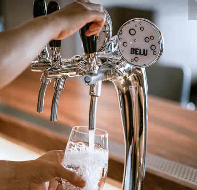 Belu water filtration tap at Salisterra restaurant for eco-friendly event catering.