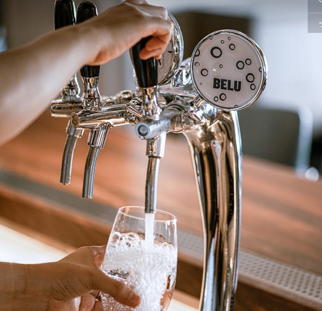 Belu water filtration tap at Salisterra restaurant for eco-friendly event catering.