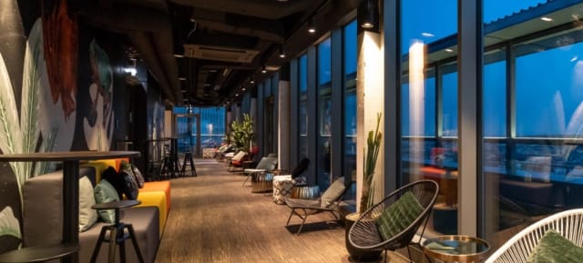 Modern TUtheSky rooftop lounge for networking events and corporate cocktail mixers.
