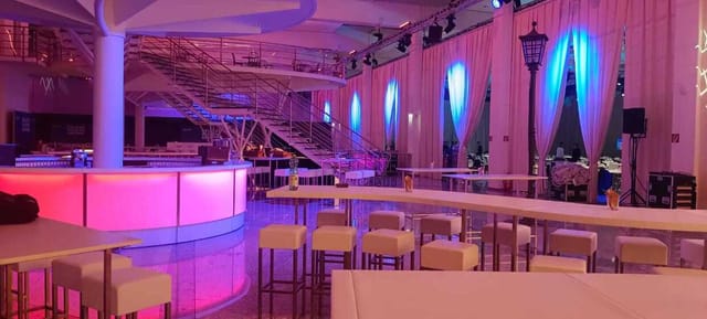 Stage 3 event space with LED lighting, ideal for corporate networking and cocktail receptions.