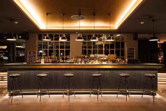 Rooftop garden bar at Ruby Marie Hotel: Upscale networking lounge for corporate events.