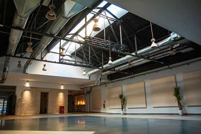 Sala Principal at Espacio Downtown: industrial-chic event venue with skylights for creative events.