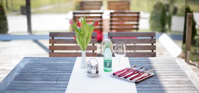 Al fresco bistro dining setup at Europahaus Wien for business lunch and networking events.