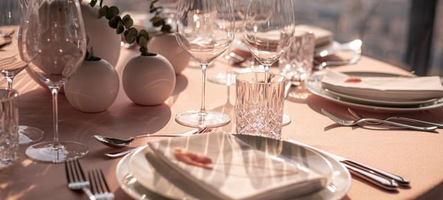 Modern minimalist dining room setup for luxury event and wedding venue.
