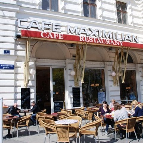 Hotel Maximilian outdoor cafe terrace for informal networking and conference social hours.