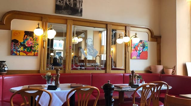Cozy bistro-style restaurant at Hotel Maximilian, perfect for private dining and networking.