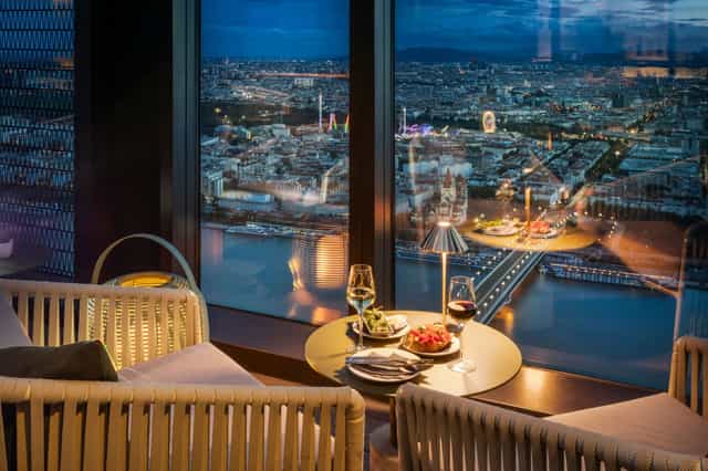 57 Restaurant & Lounge VIP space with floor-to-ceiling city views for luxury corporate events.
