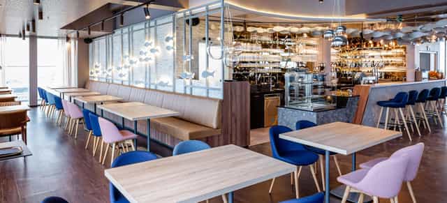 Modern bar at 360 OCEAN SKY with banquette seating for networking mixers and corporate events.