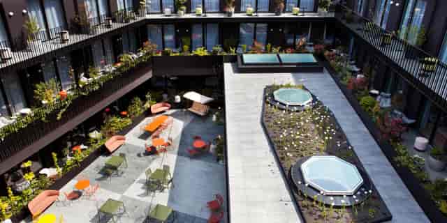 Hotel Indigo Vienna courtyard for boutique networking events and corporate meetings.