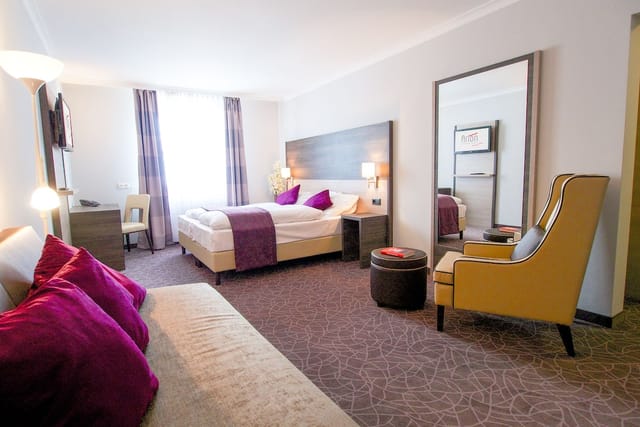 Arion City Hotel room, compact business hotel for overnight stays and corporate travel.