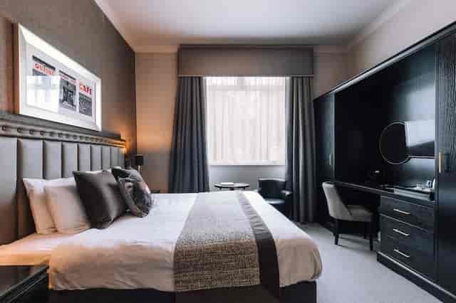 Contemporary hotel function suite with workspace for corporate events and business travel.