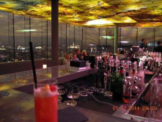 SO/ Vienna bar with floor-to-ceiling city views for VIP reception and networking events.