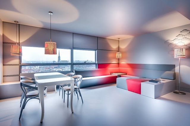 SO/ Vienna VIP suite with city views for modern breakout meetings and corporate event hosting.