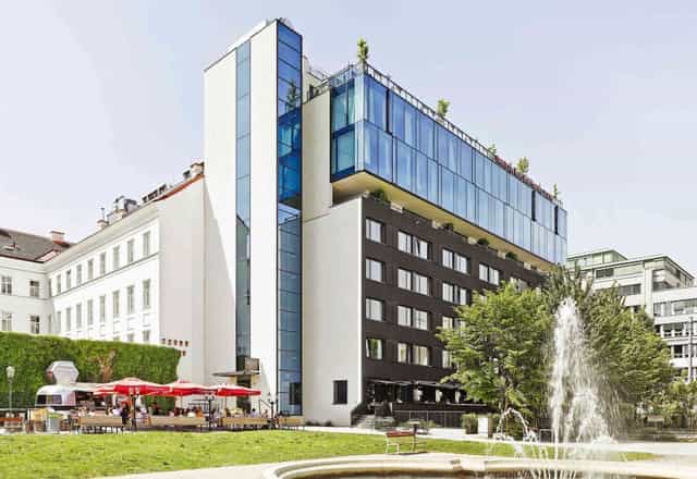 Modern rooftop bar terrace at 25hours Hotel, ideal for social receptions and networking events.