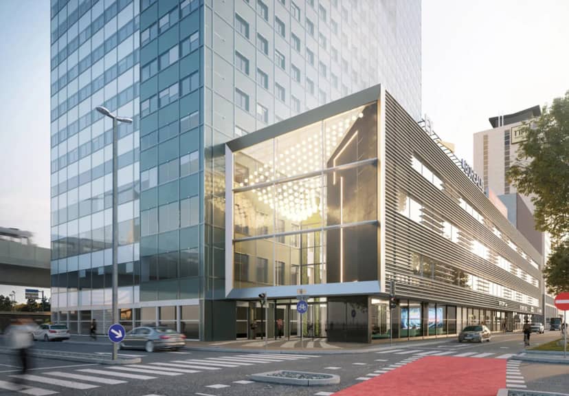 Modern glass atrium office space at IZD Tower, ideal for corporate conferences and events.