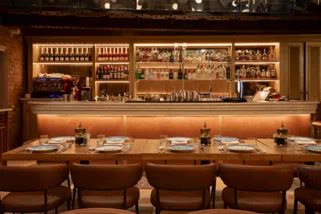 Private dining room at Bocconcino Mayfair with warm lighting for VIP networking and board dinners.
